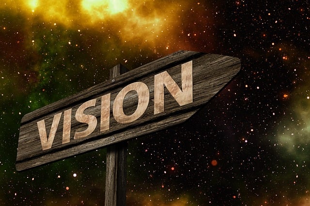 Arrow sign with the word vision on it