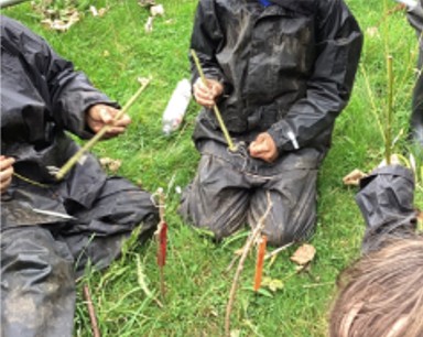Making things with sticks at Forest School