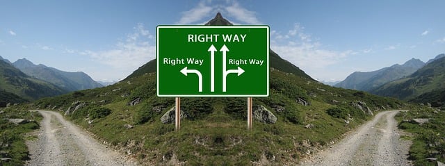 Direction sign showin three routes with "right way" marked